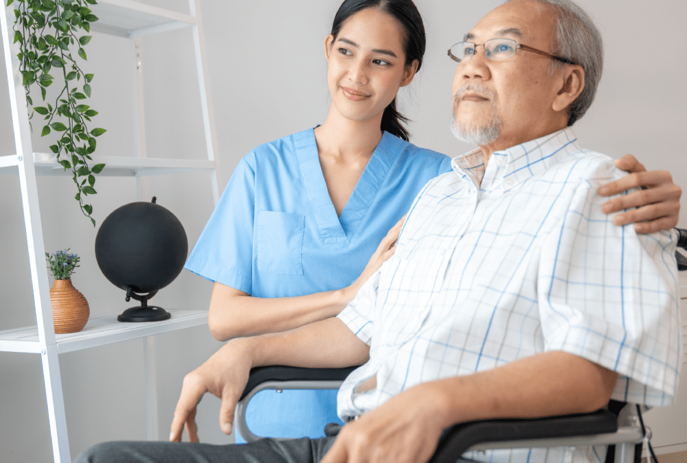 Caring nurse and a contented senior man in a wheel chair at home, nursing house. Medical for elderly patient, home care for pensioners.